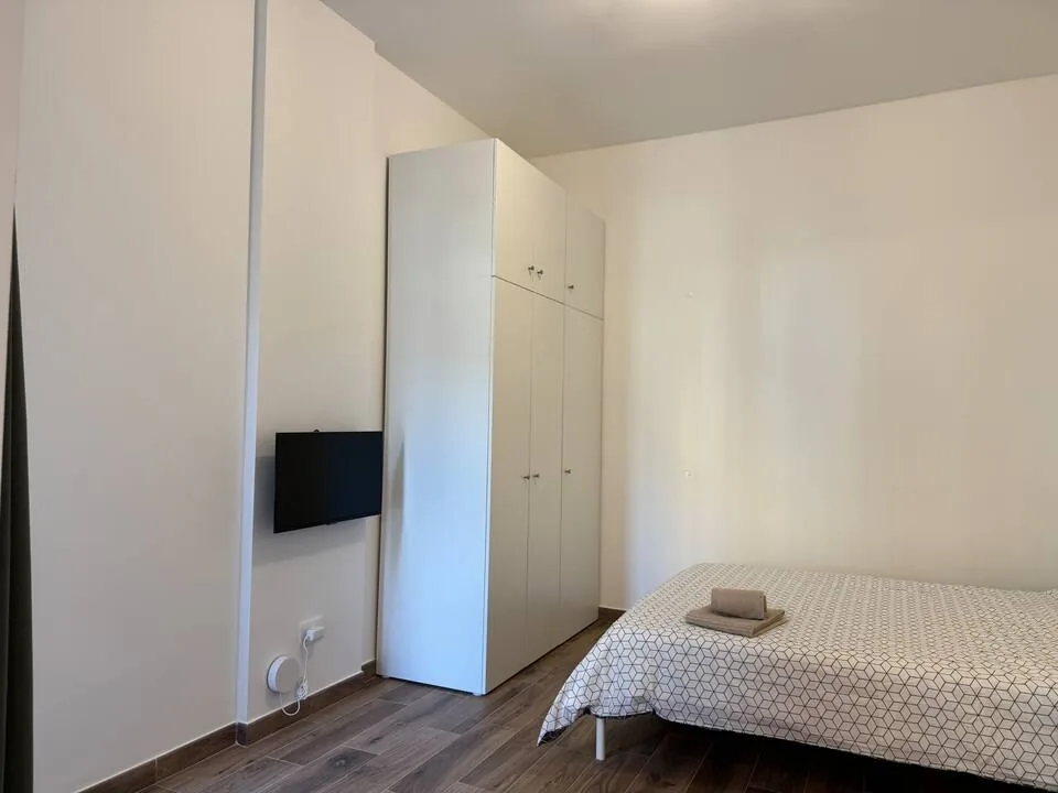 Flower — möblierte Wohnung in Mailand — Schlafzimmer