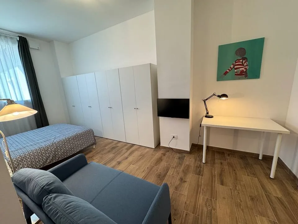 Orange — möblierte Wohnung in Mailand — Schlafzimmer